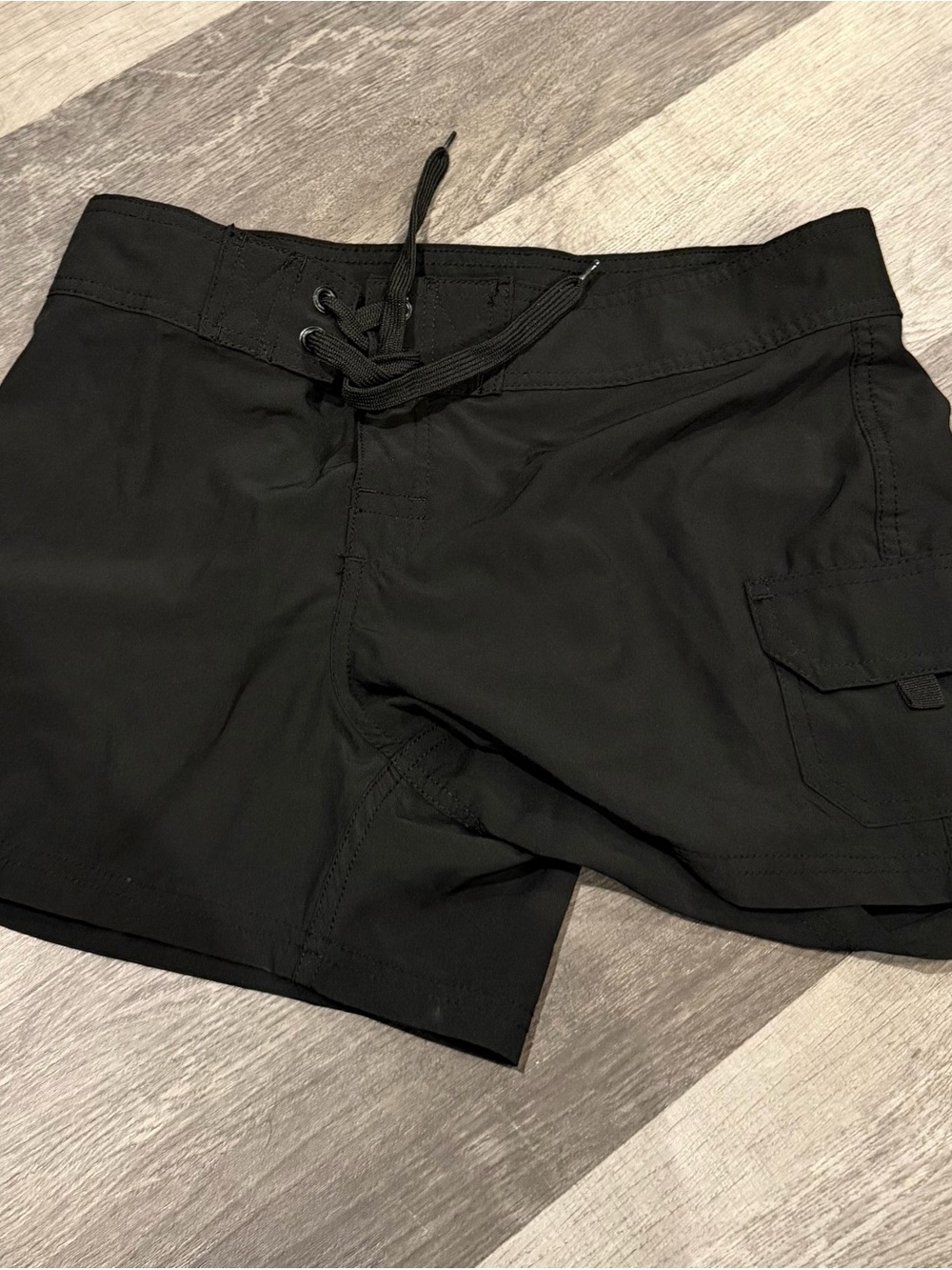 Kanu Surf Black Women's Athletic Swim Shorts with Cargo Pocket